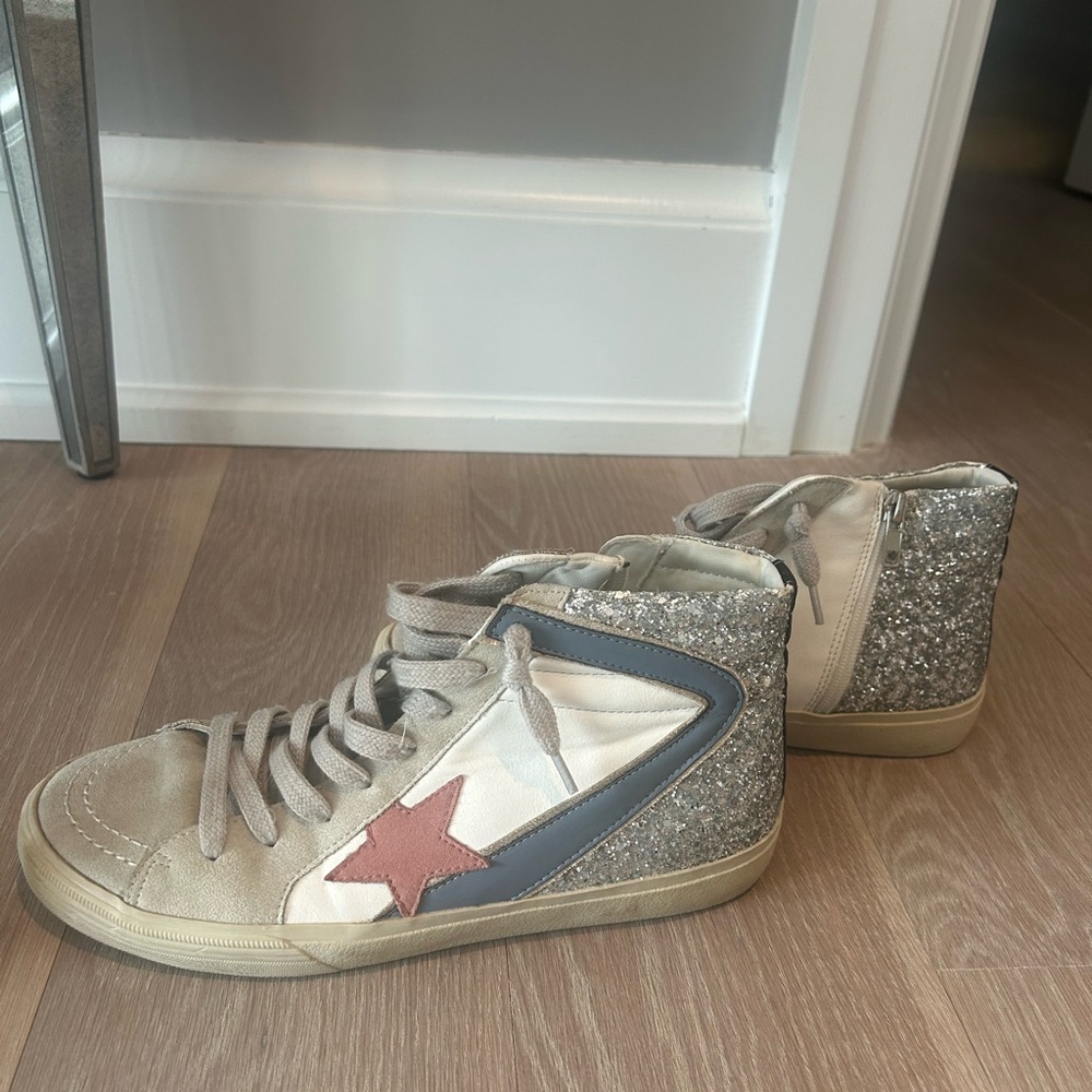 High top sneakers. Multi color with some sparkle. Super cute. Size 8.